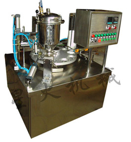 口杯自動(dòng)封蓋機(jī)